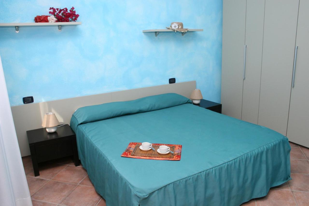 Residence Il Borgo Di Porto Corallo Villaputzu Bagian luar foto
